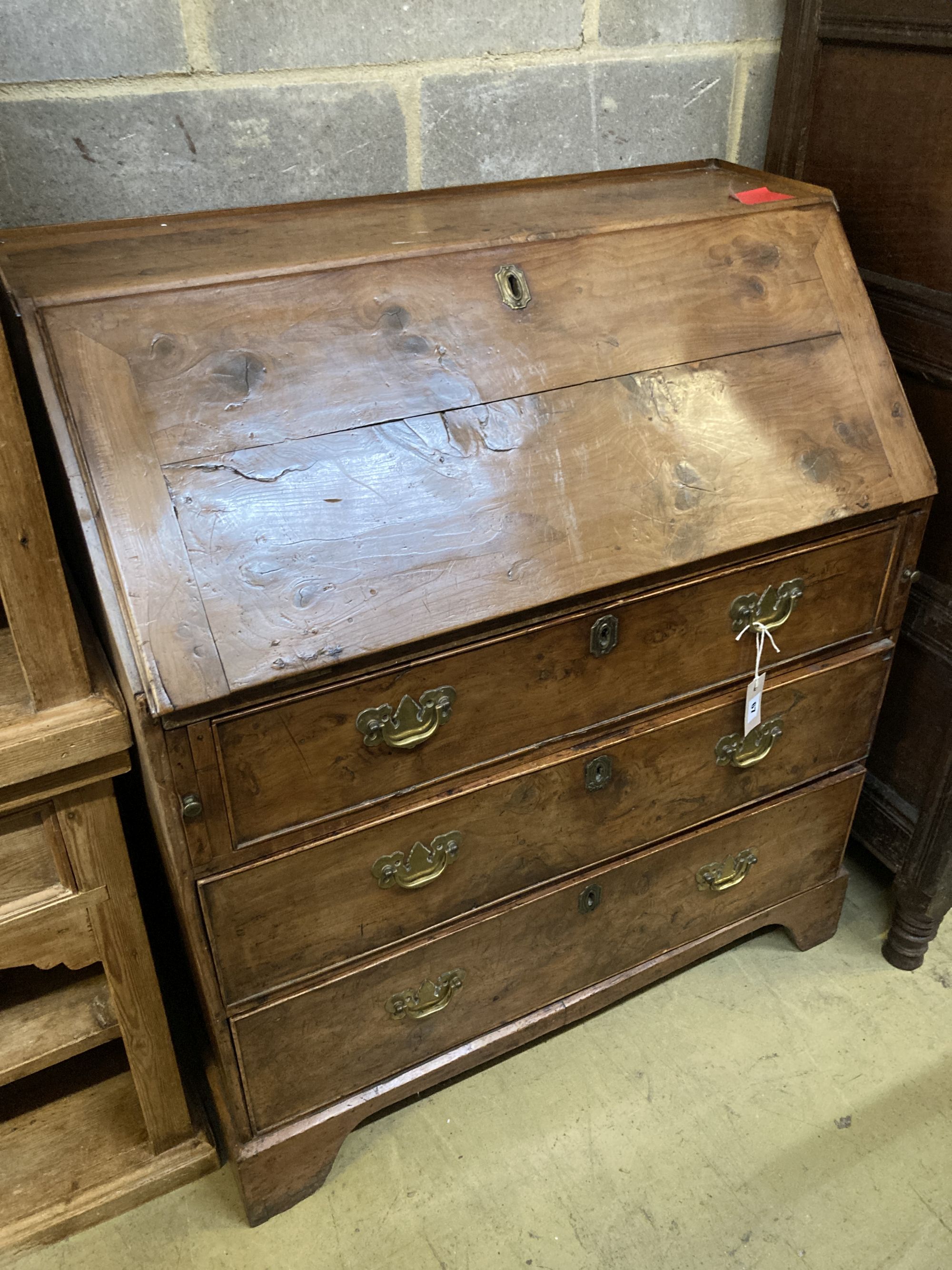 A George III provincial yew wood bureau, width 89cm, depth 48cm, height 101cm